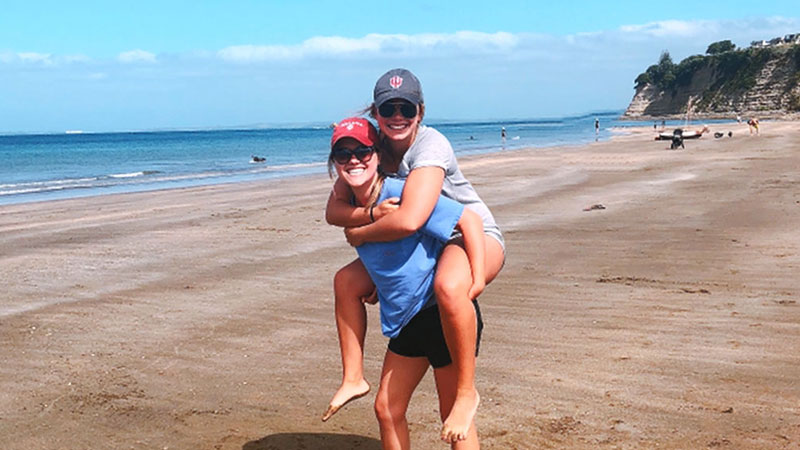 Global Gateway participants standing on a beach in New Zealand