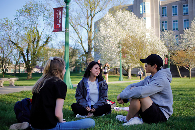students-sitting-on-SOE-lawn-768x512.jpg