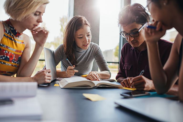 Students studying at table